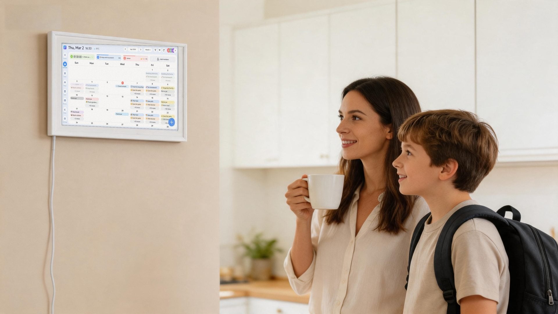 The calendar mounted in landscape beside the fridge